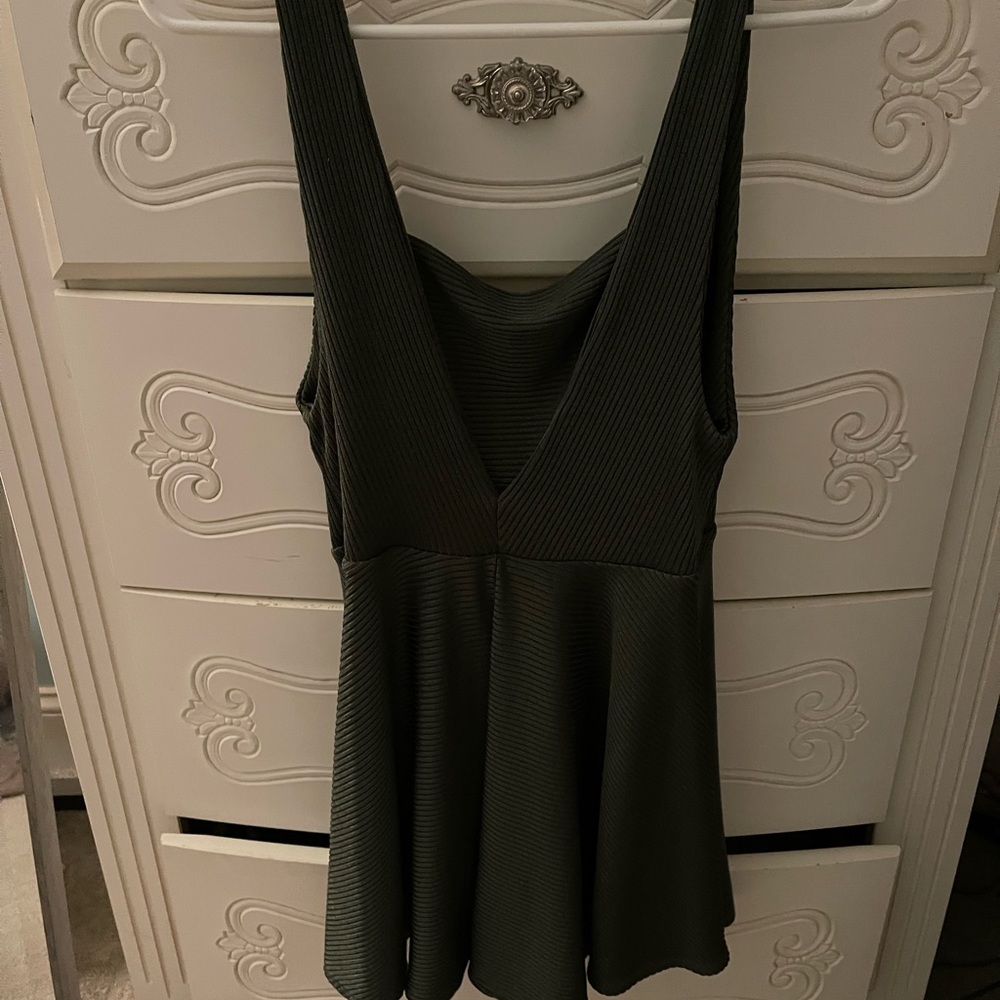 Dark green sleeveless romper